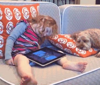 a dog and a baby are both sleeping